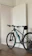 A happy customer receiving their securely transported mountain bike at their doorstep.