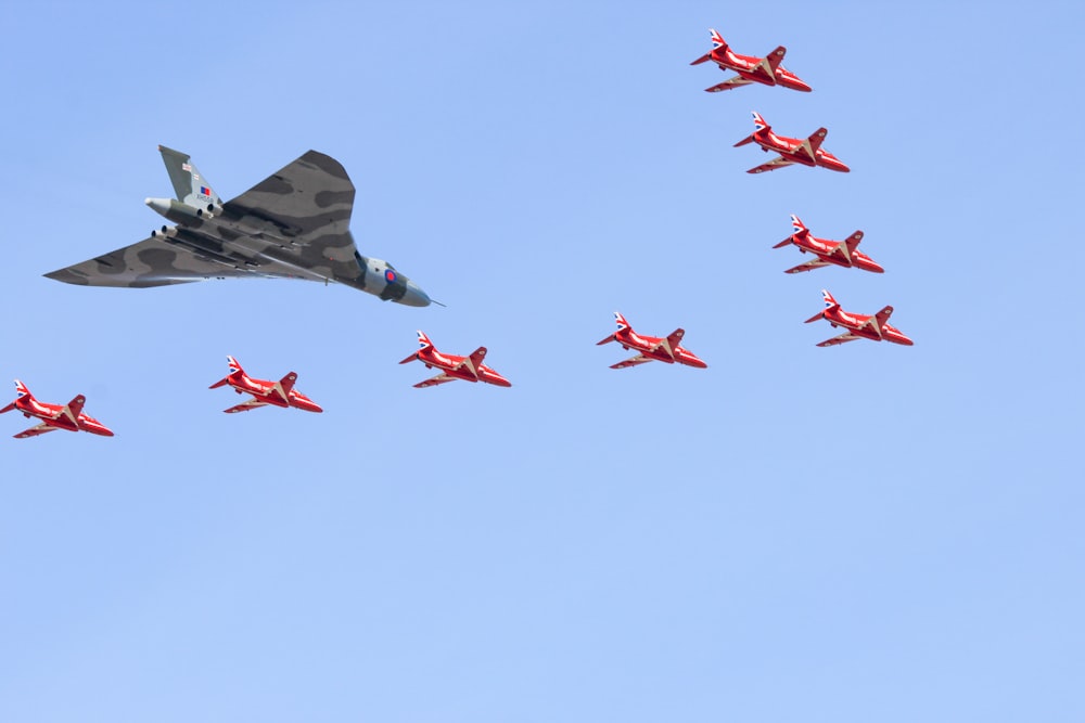 a group of airplanes flying in the sky