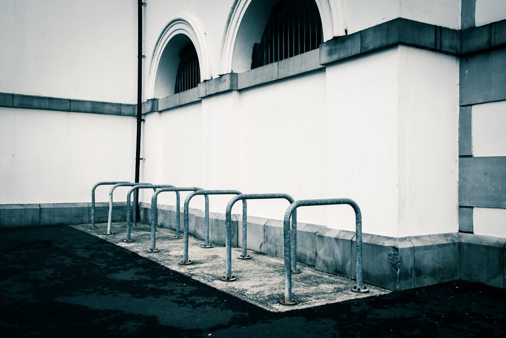 a concrete building with metal railings