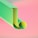 a green and yellow letter