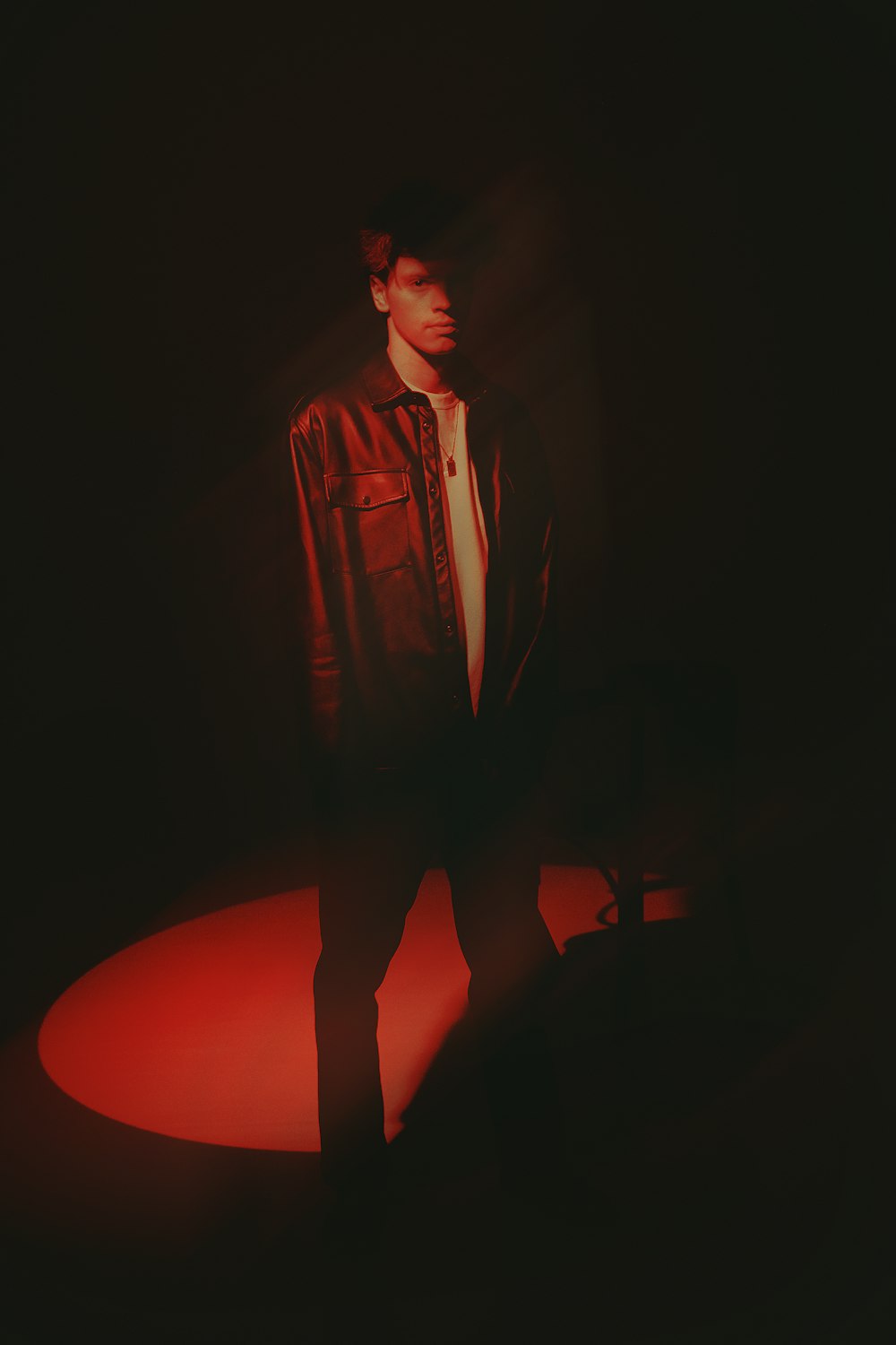 a person standing in a dark room