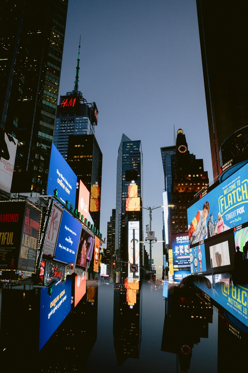 a city street with many billboards