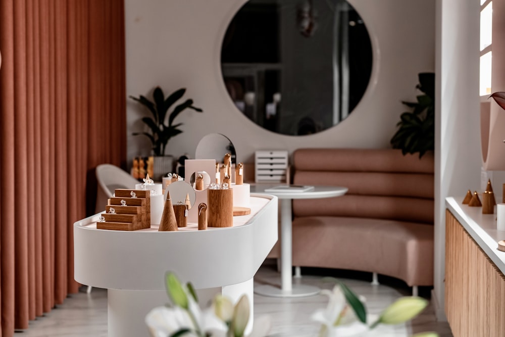 a dining room table with a mirror