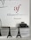 Wall signage featuring the Alliance Française logo in red and grey with the word 'Armenia' below. A minimalist office setting with grey cabinets, a printer on one side, and decorative models of the Eiffel Tower on a desk.