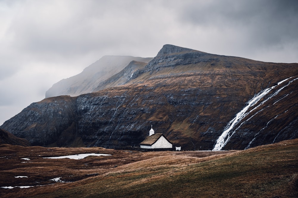 a small house on a mountain