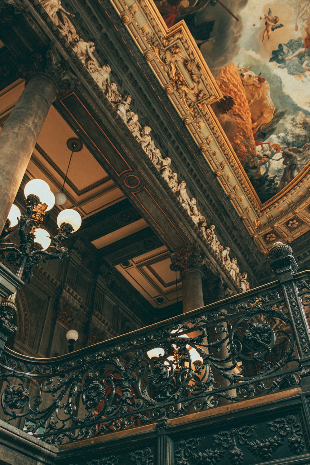 a large ornate ceiling with many light fixtures