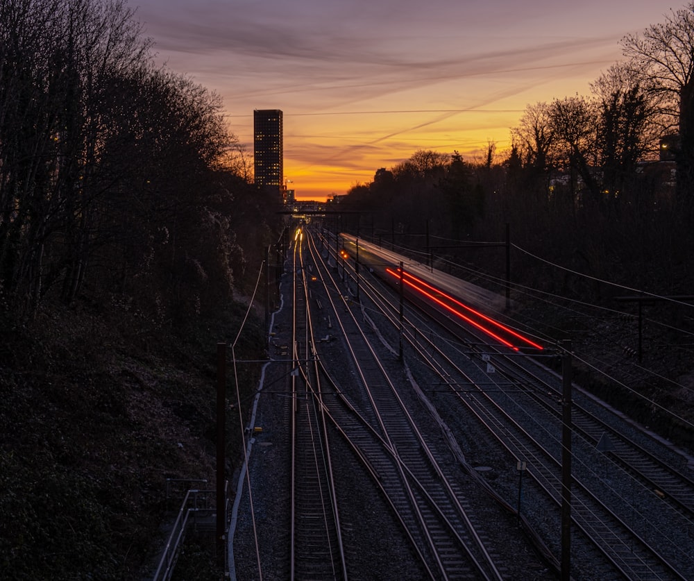 a train travels down the tracks