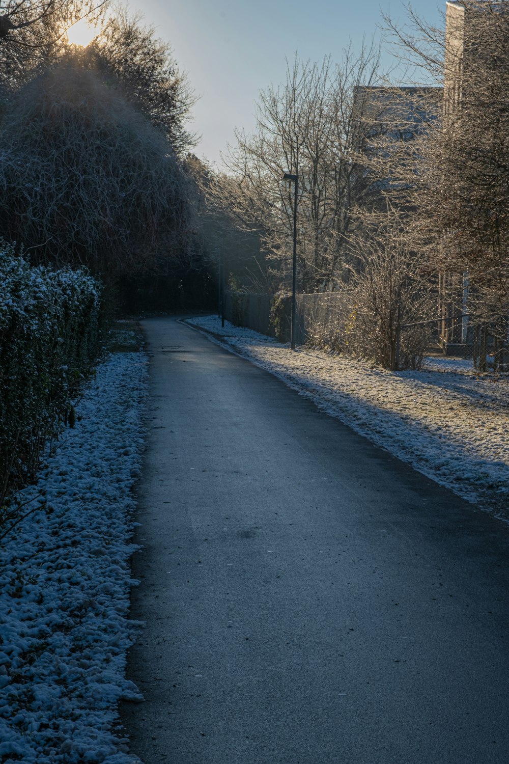 a road with snow on the side
