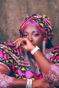 A vibrant photo of a woman wearing a colorful Ankara blazer, showcasing ethnic prints.