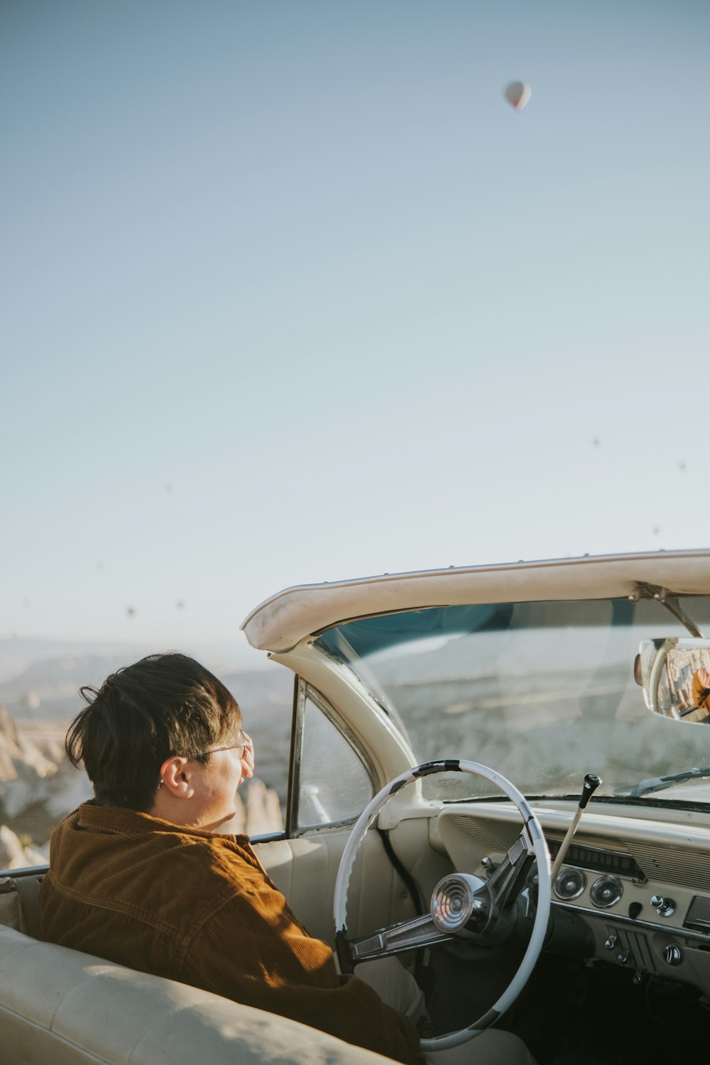 a man driving a car