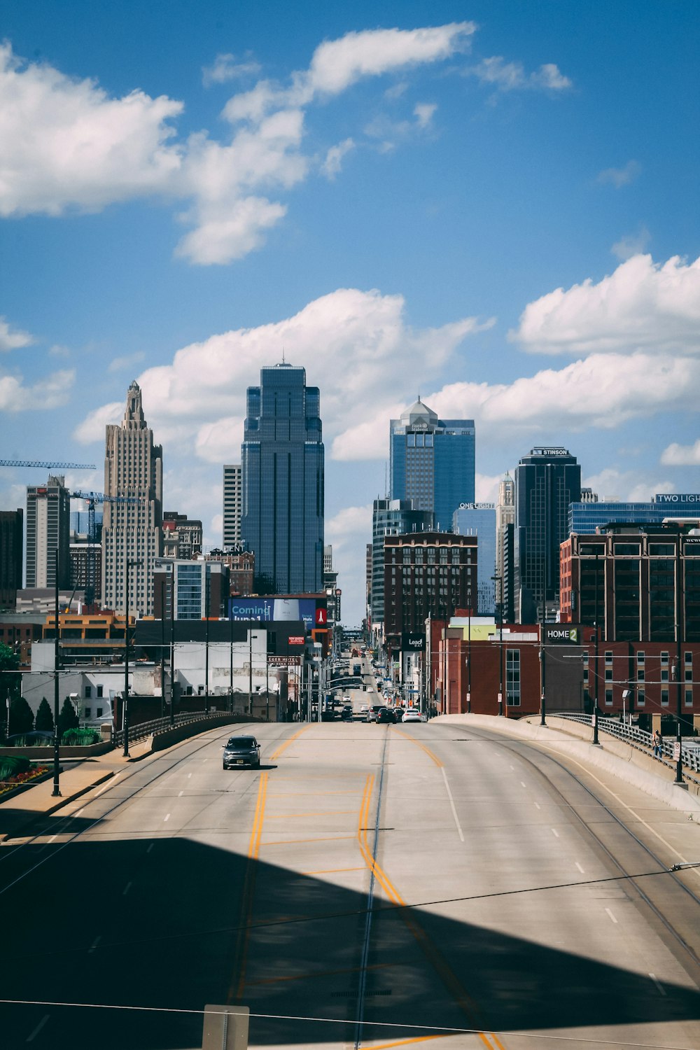 a city street with tall buildings