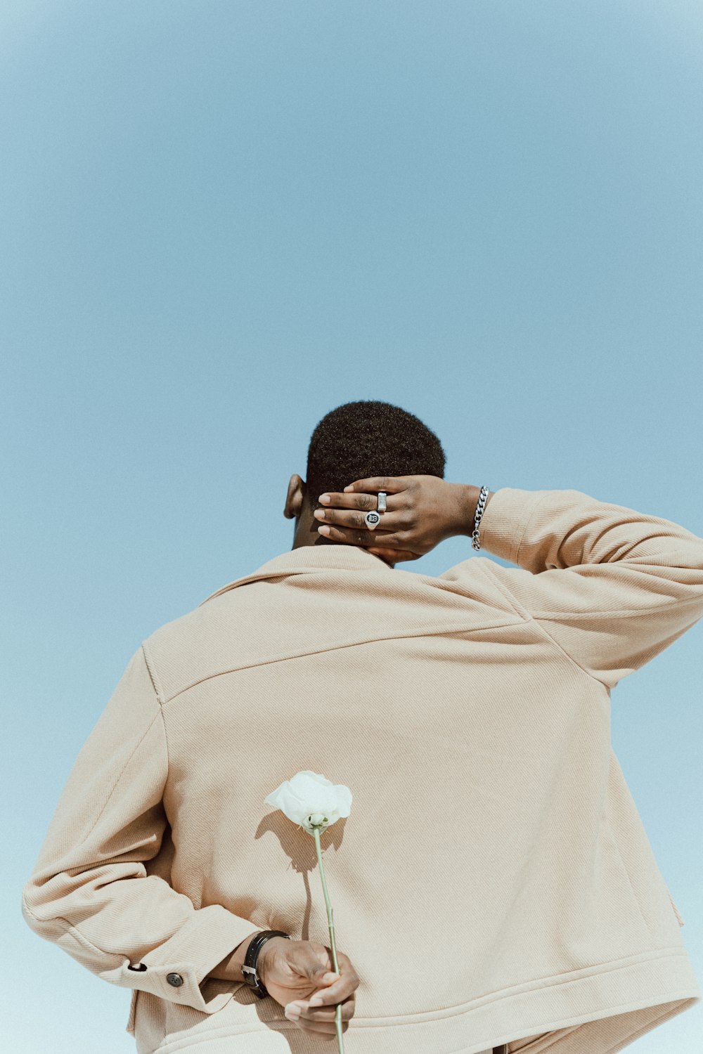 a person holding a flower