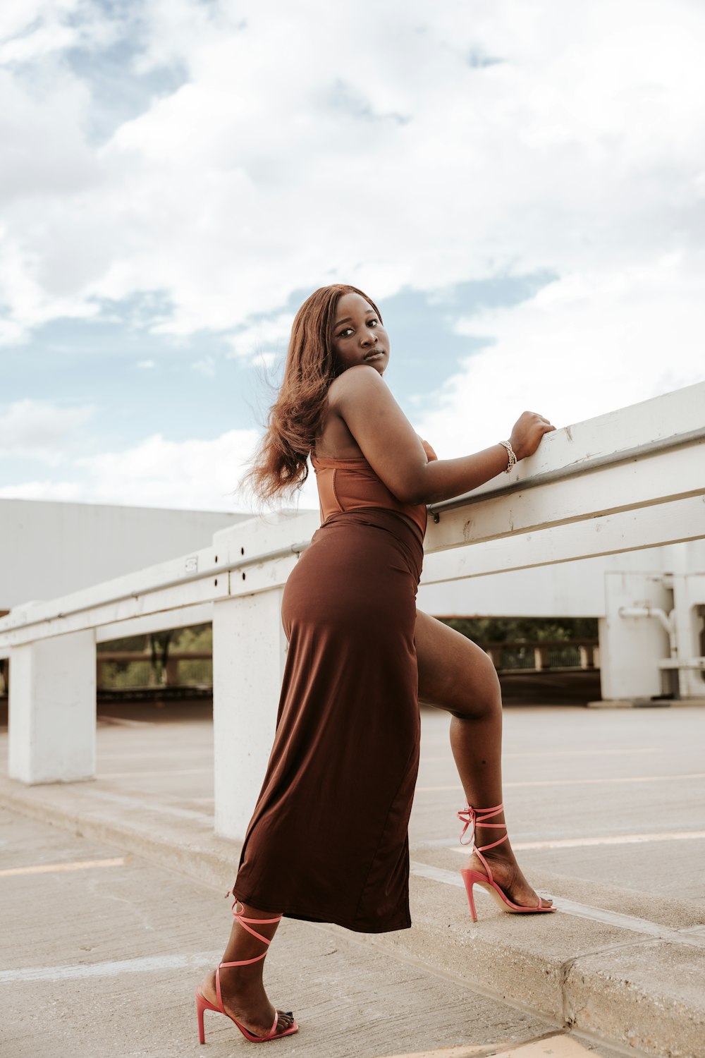 a woman in a dress posing for a picture