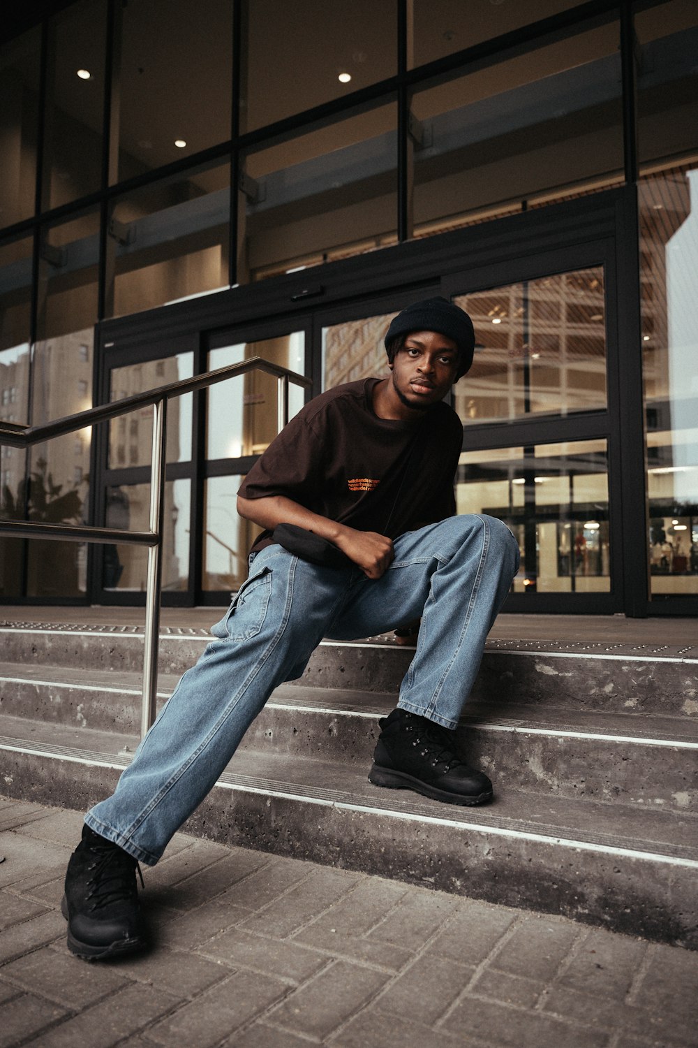 a man sitting on a ledge