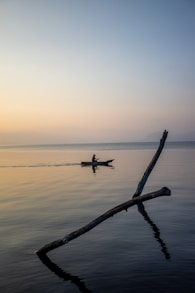 a person on a boat in the water