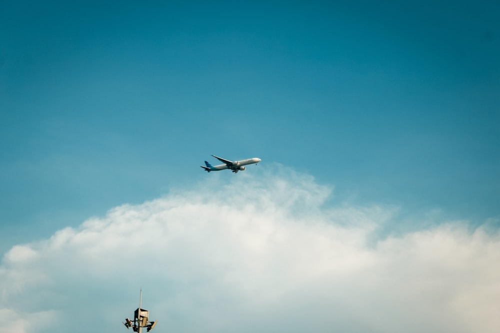 an airplane flying in the sky