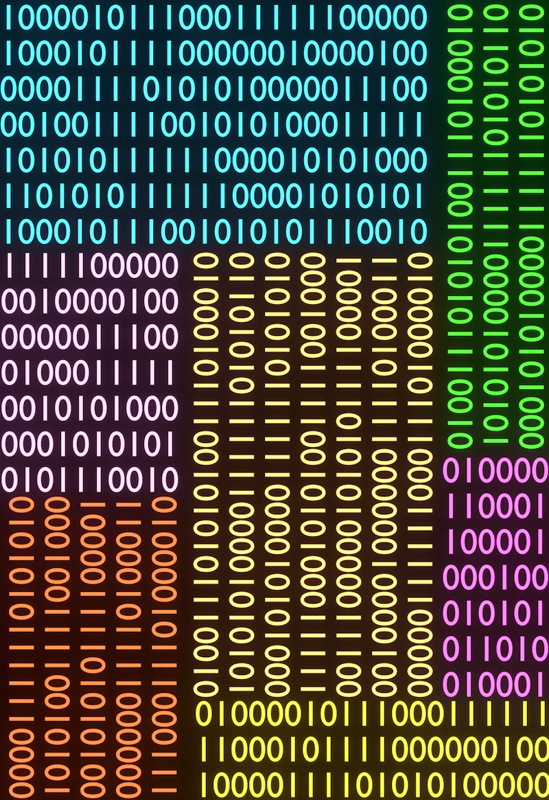 Colorful columns of binary code on a dark screen