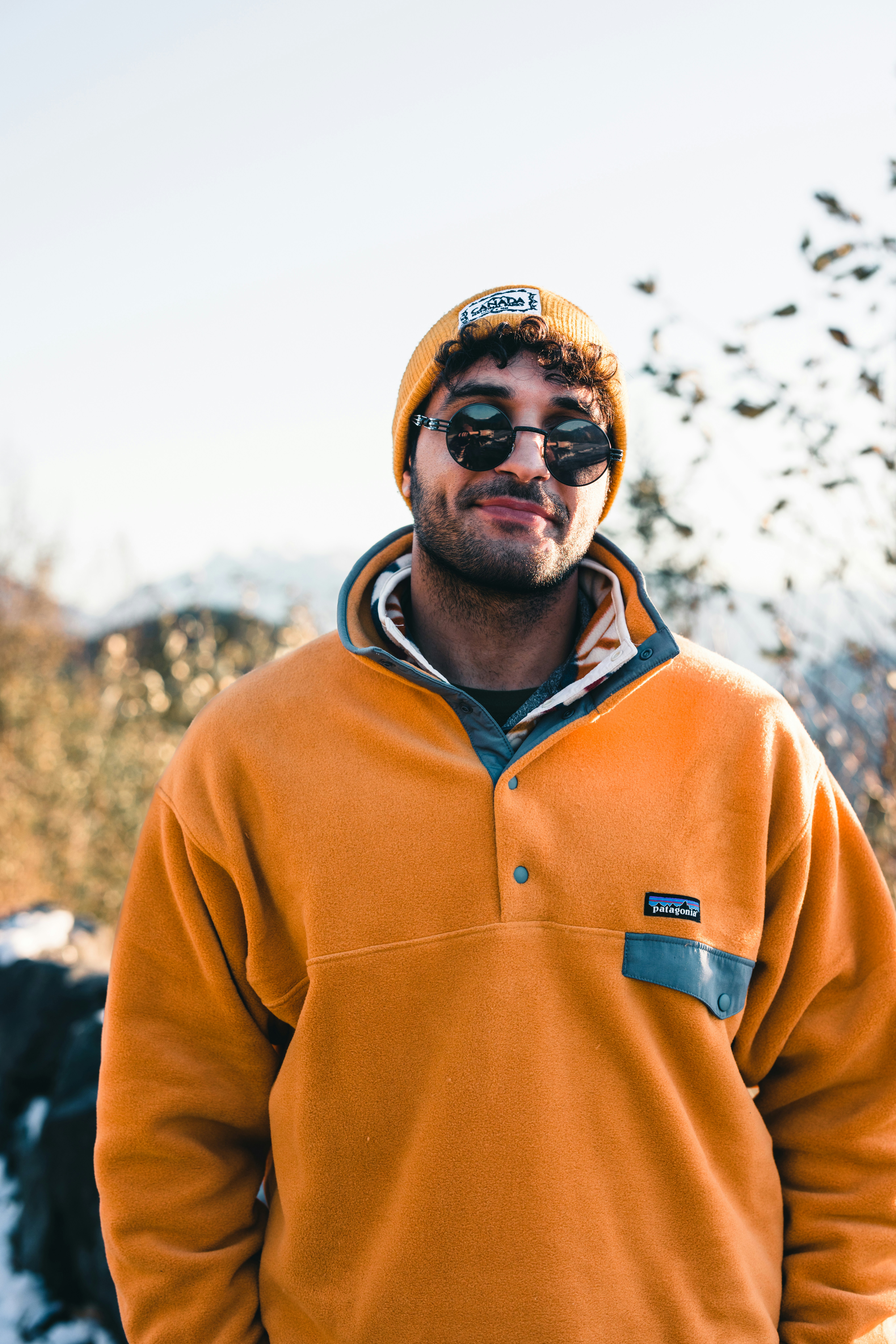 A man wearing sunglasses photo Free Canada Image on Unsplash