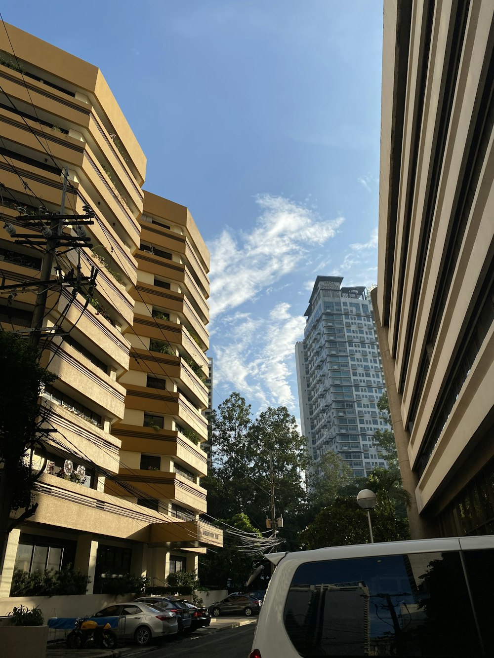 a street with cars and buildings on either side of it