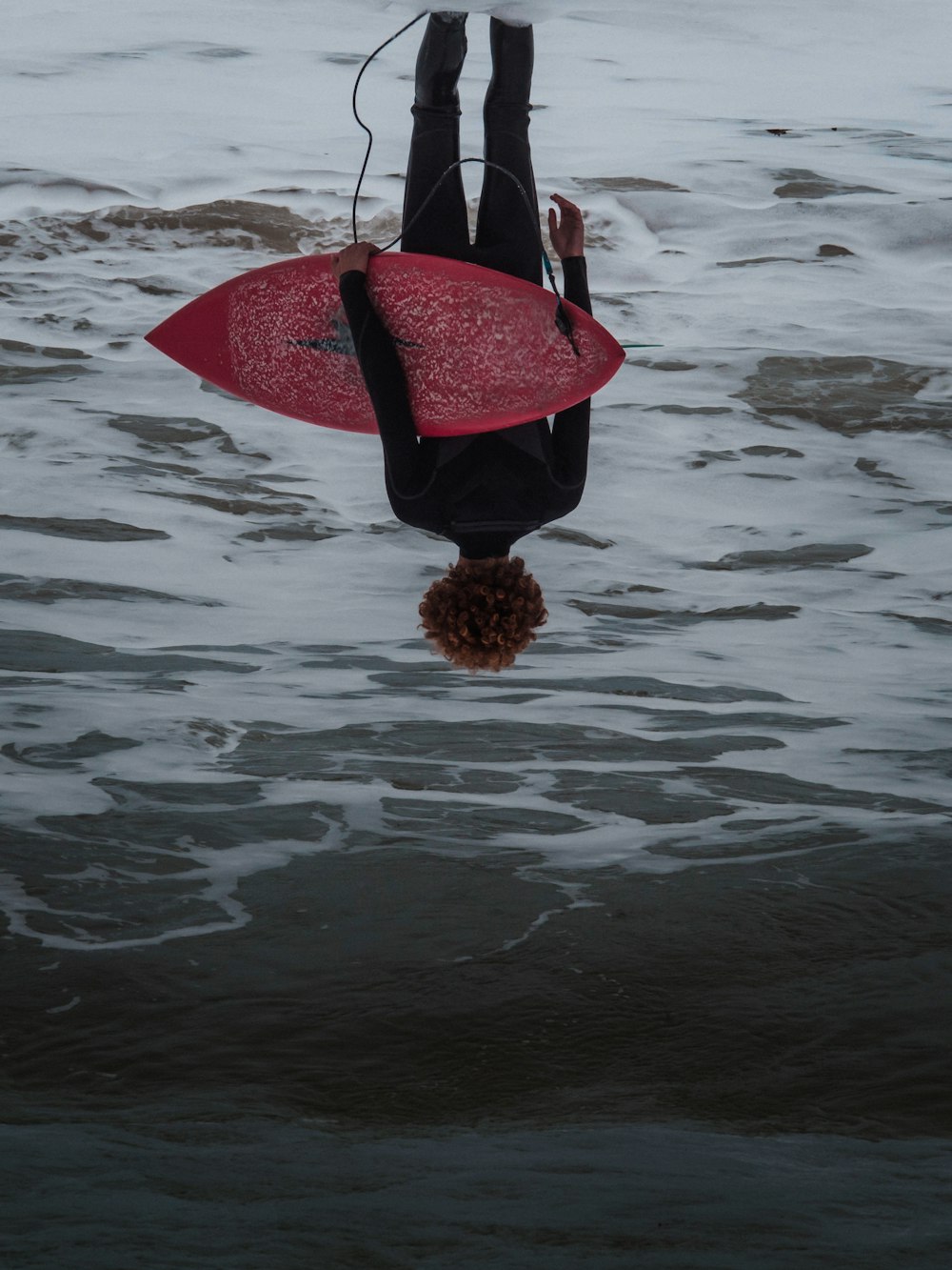 a person from a surfboard