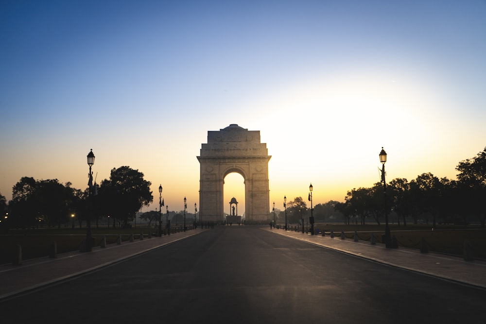 a road with a large arch