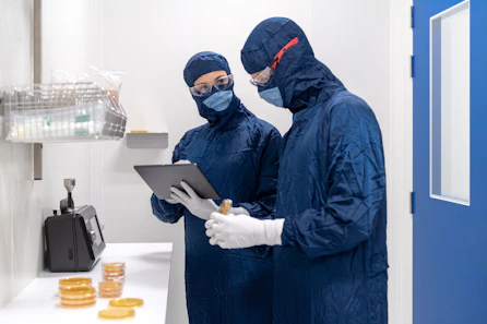 a couple of people wearing masks and gloves and gloves