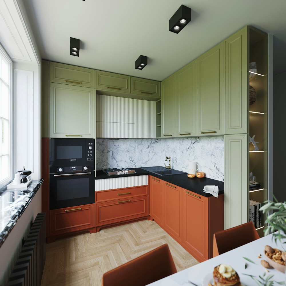 a kitchen with green cabinets