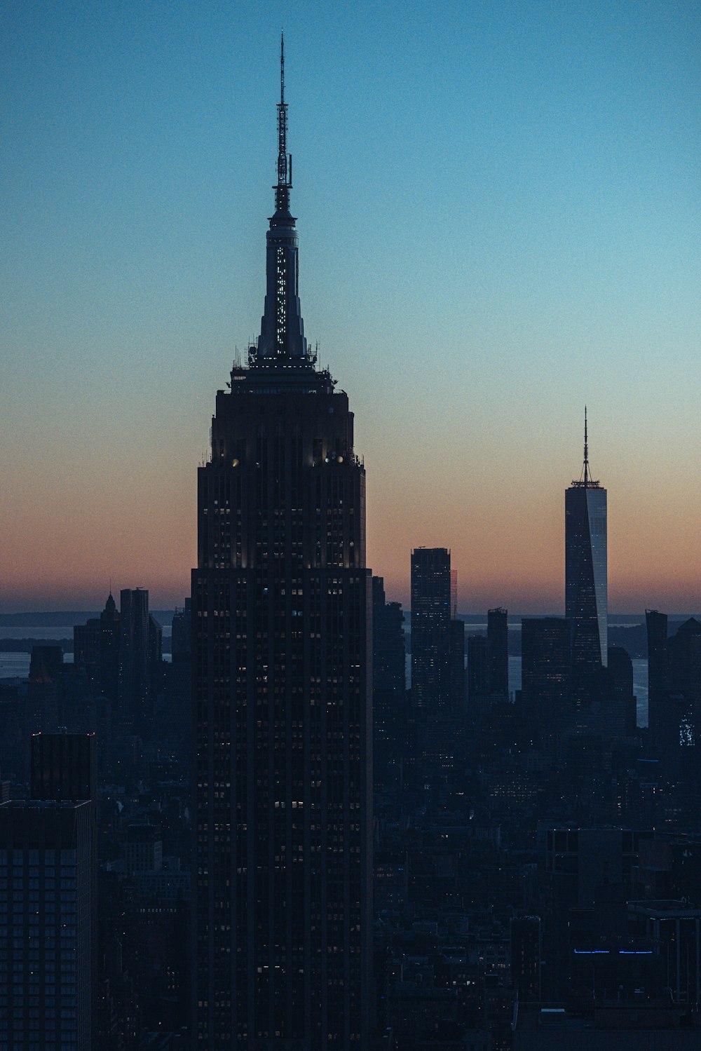 Empire State Building skyline with tall buildings