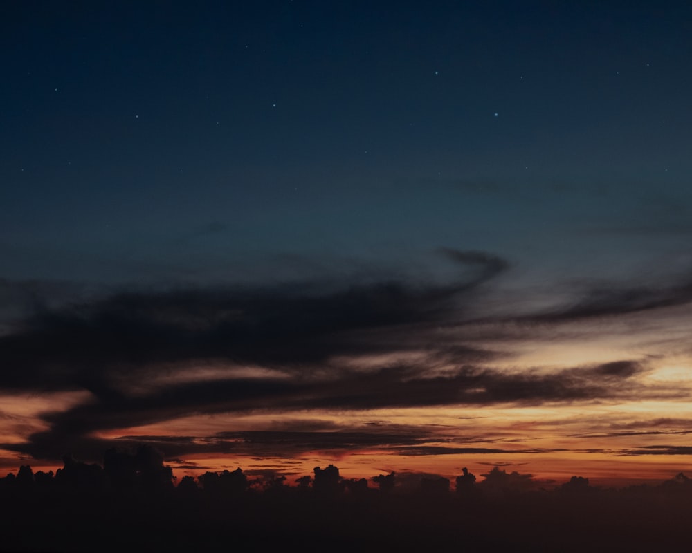 a cityscape at sunset