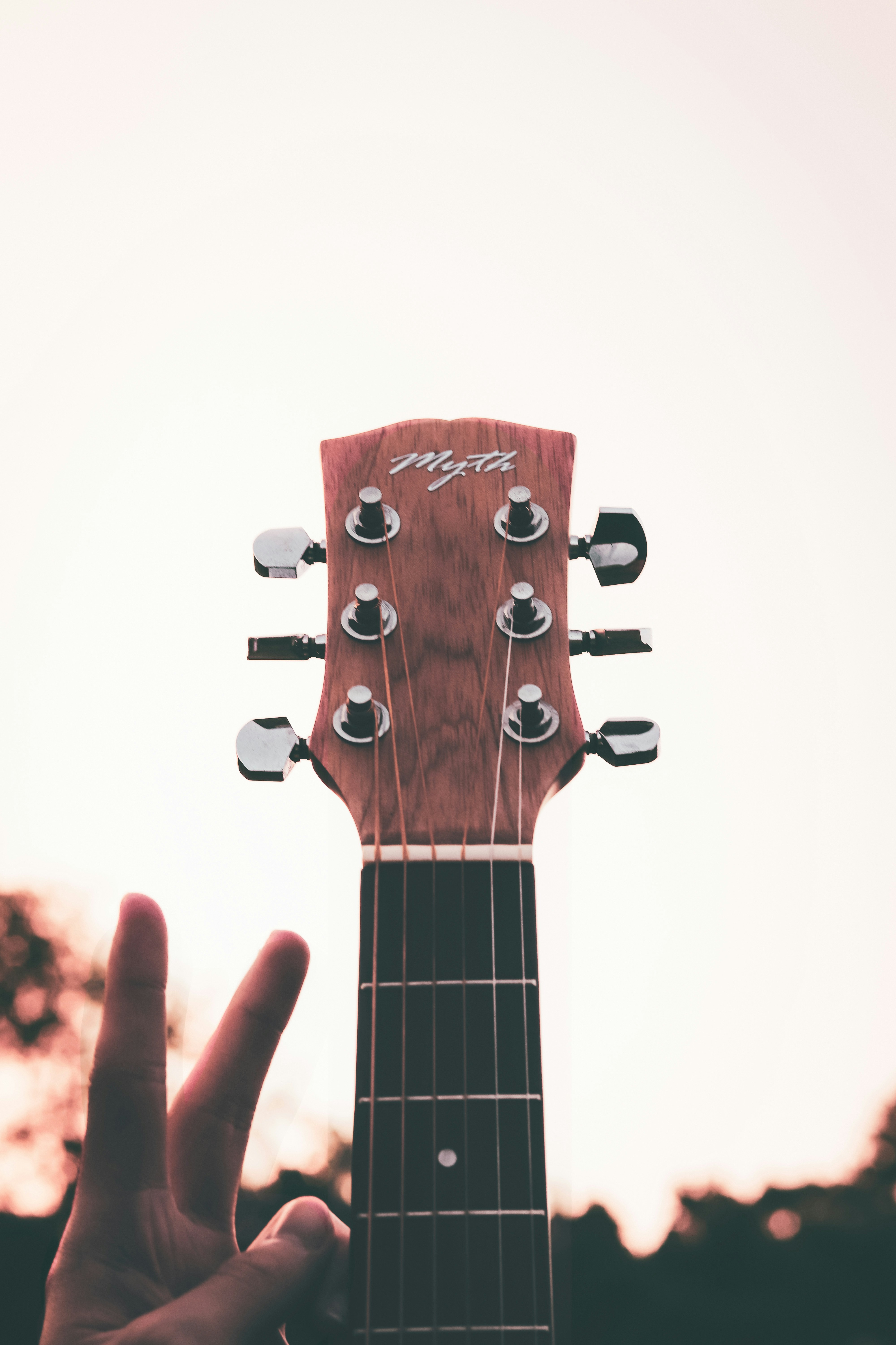a person holding a guitar
