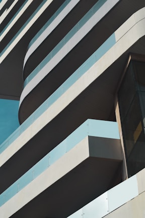 Architectural detail highlighting the sleek lines and artistry of Trilive’s exterior.