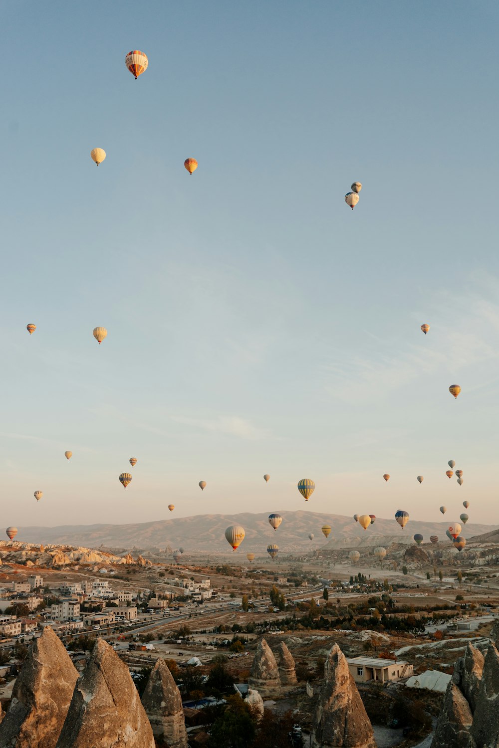 a group of hot air balloons in the sky