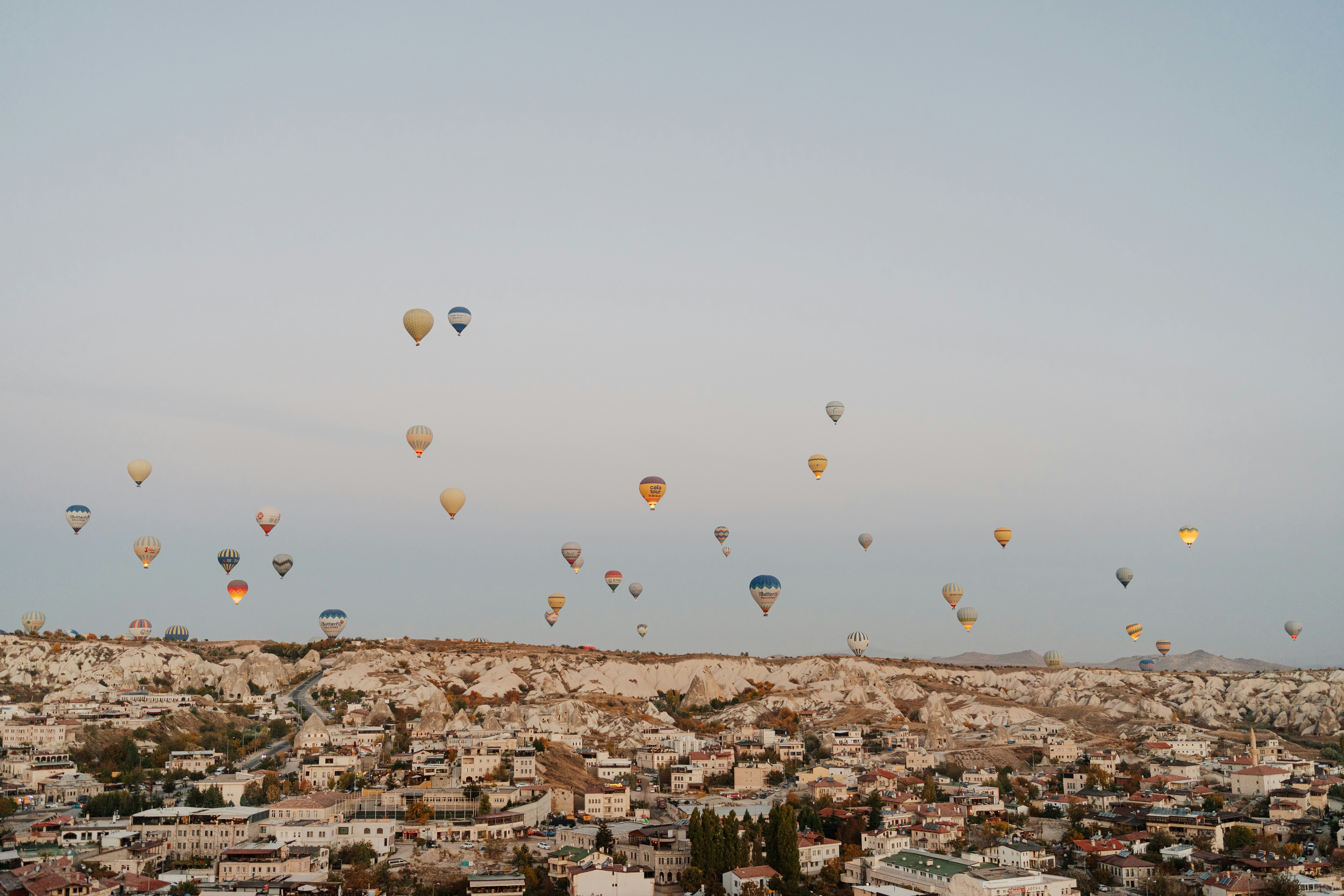 a group of hot air balloons in the sky