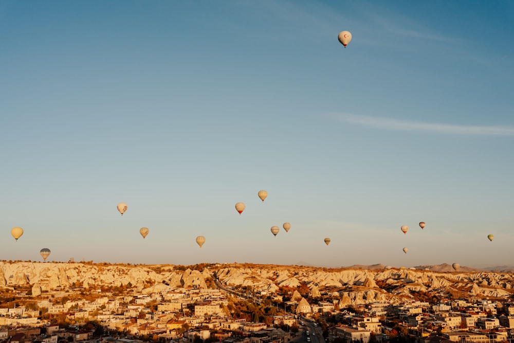 a group of hot air balloons in the sky