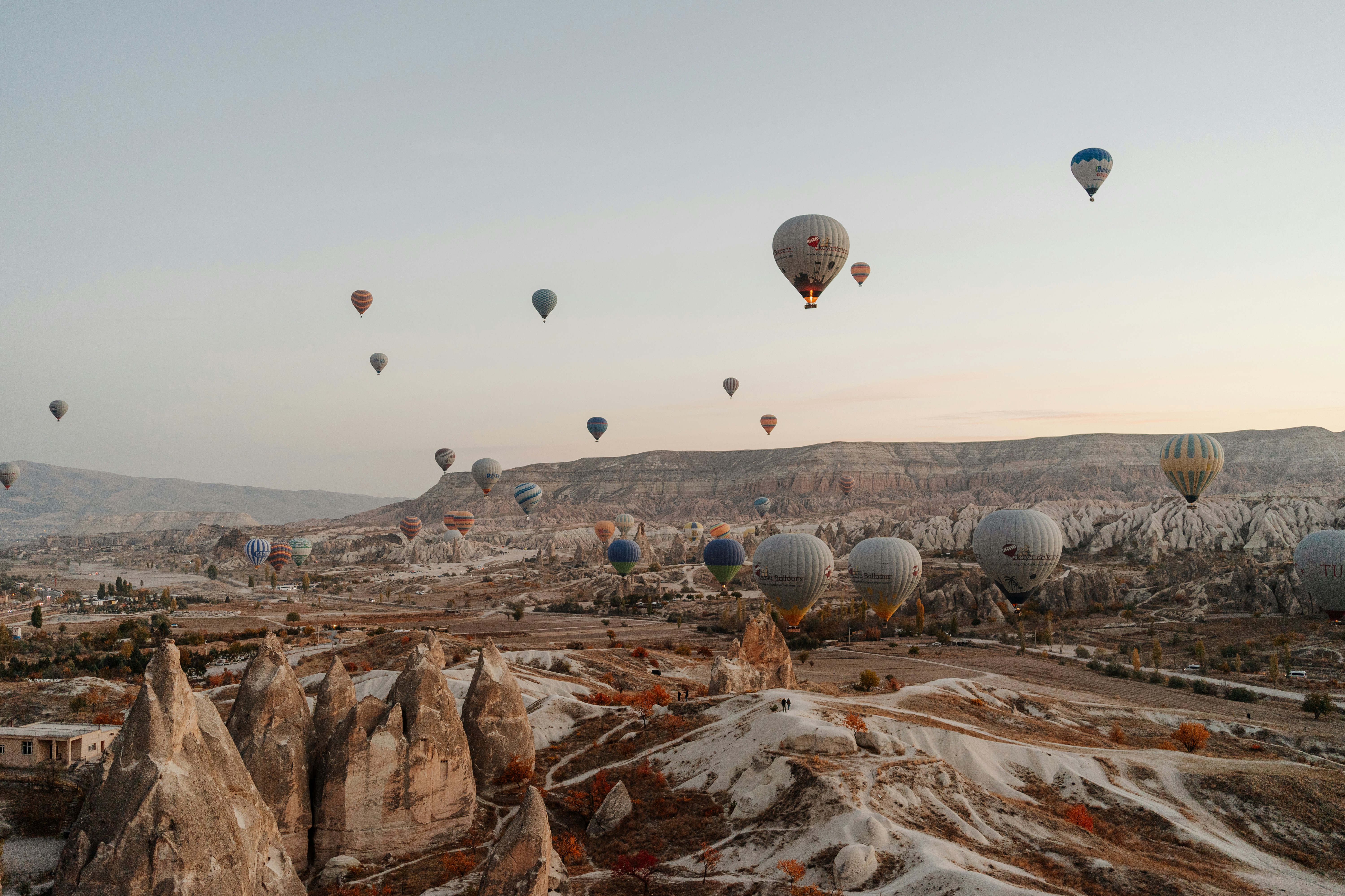 a group of hot air balloons in the sky