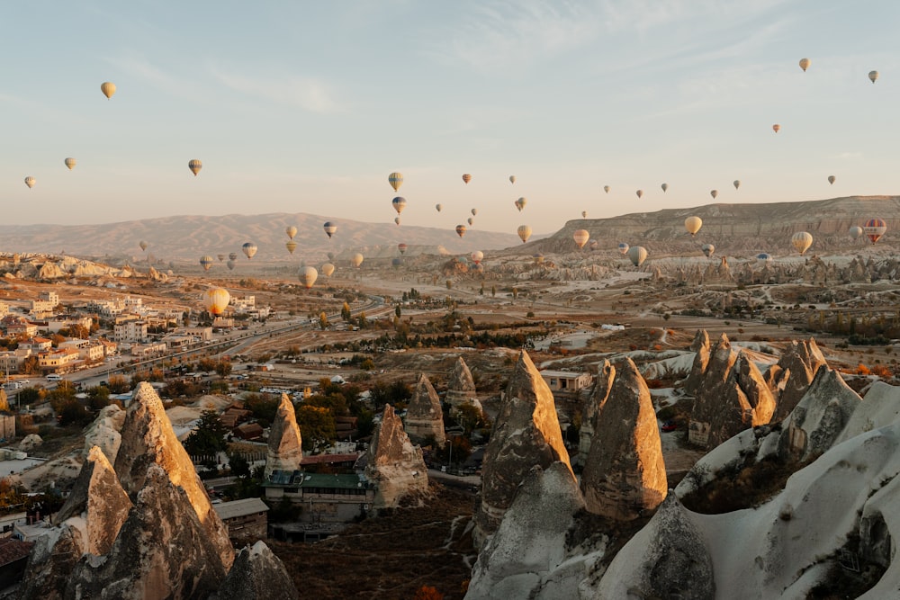 a group of hot air balloons in the sky