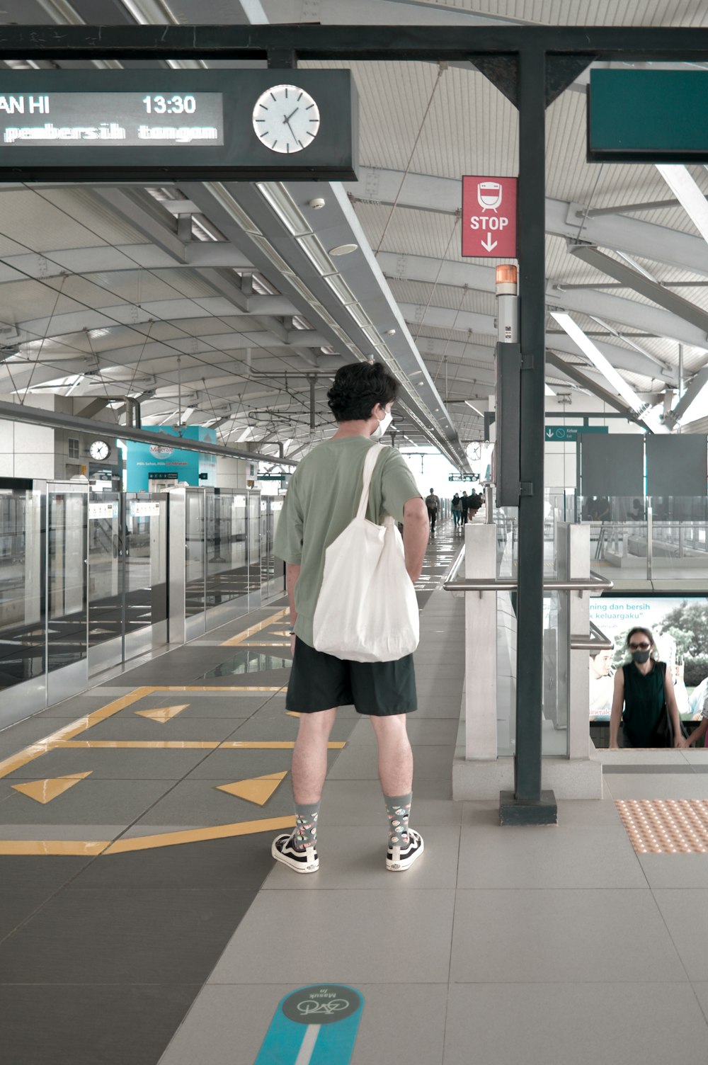 a man standing in a train station