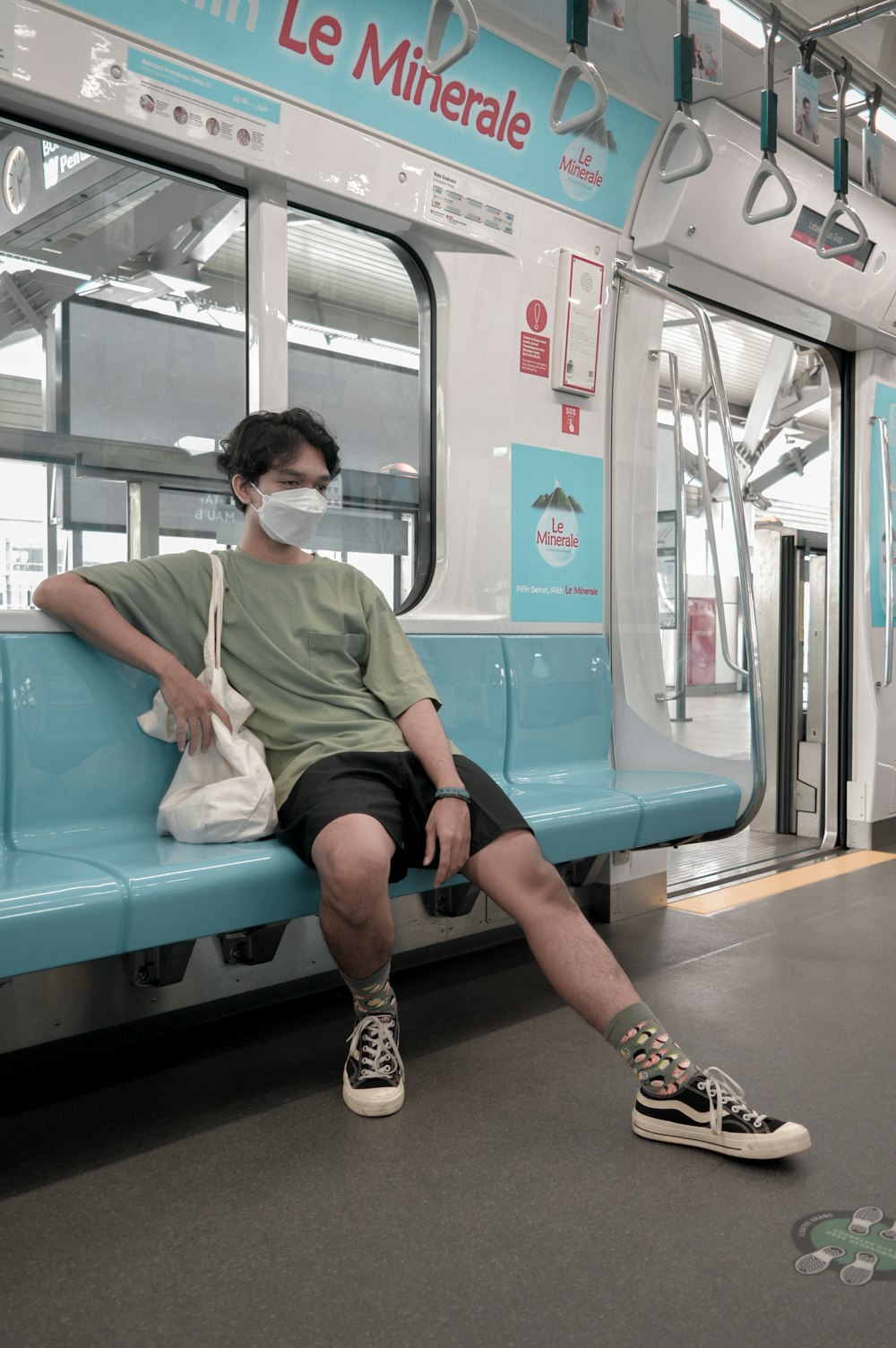 a man sitting on a bench