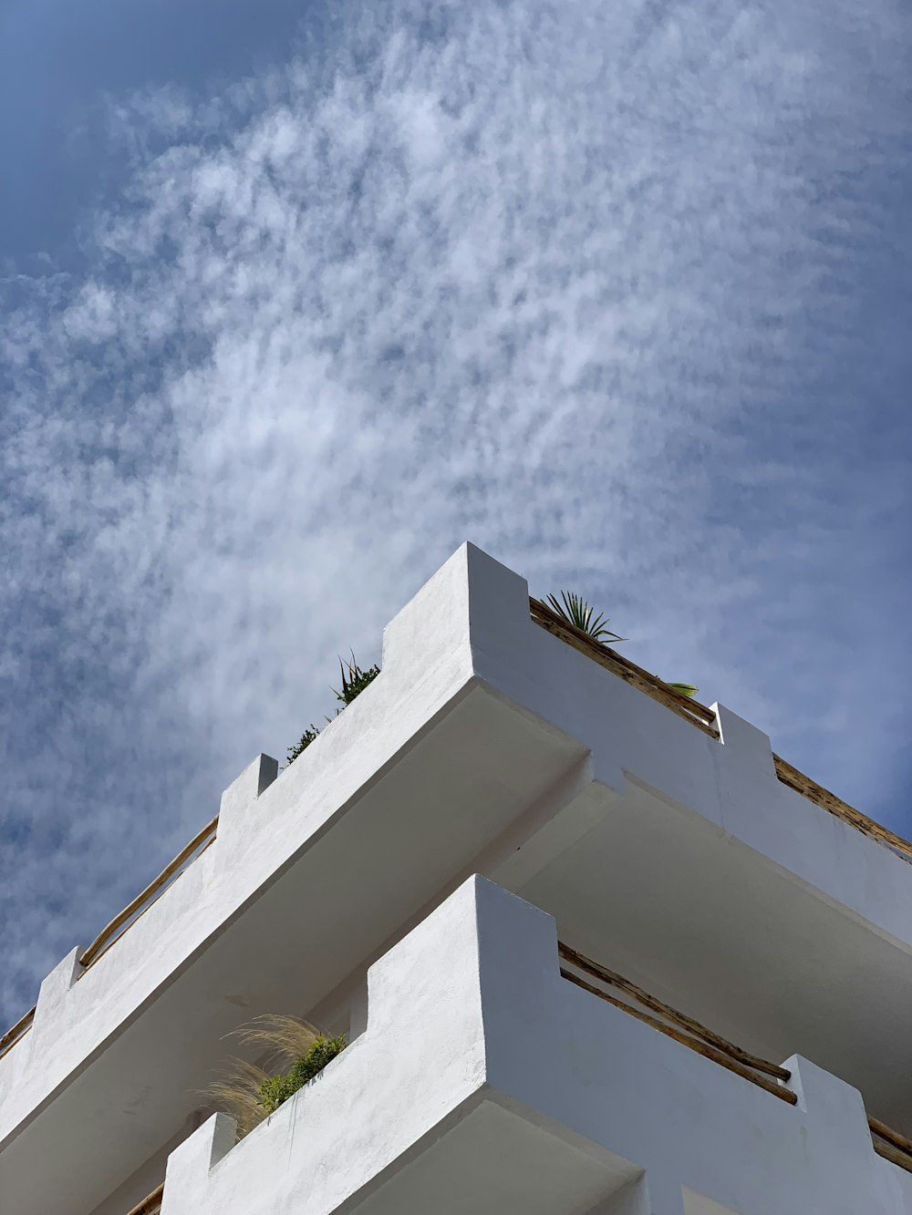 a building with a cloudy sky