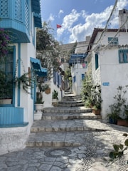 a stone street with buildings on both sides