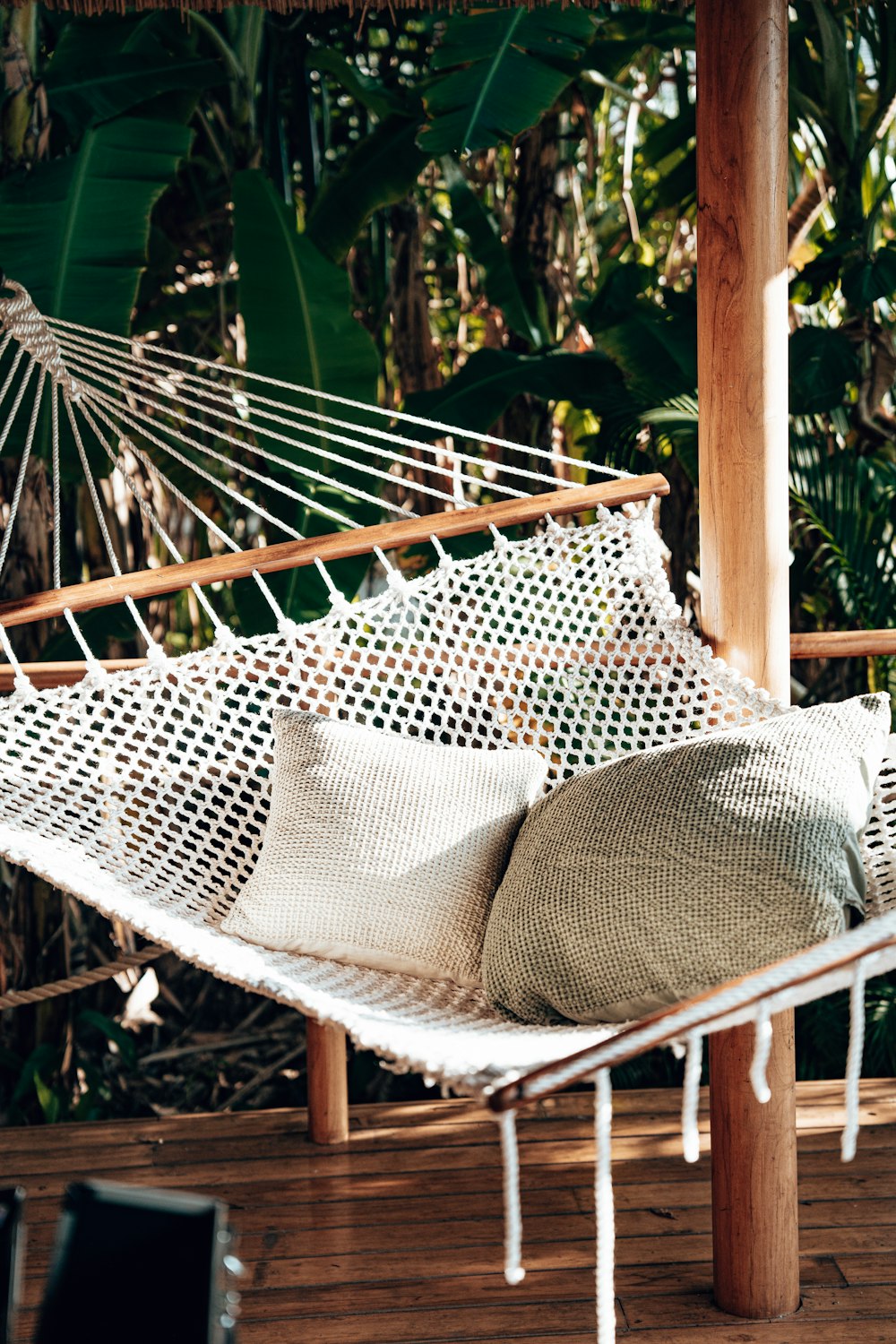 a table and chairs on a deck