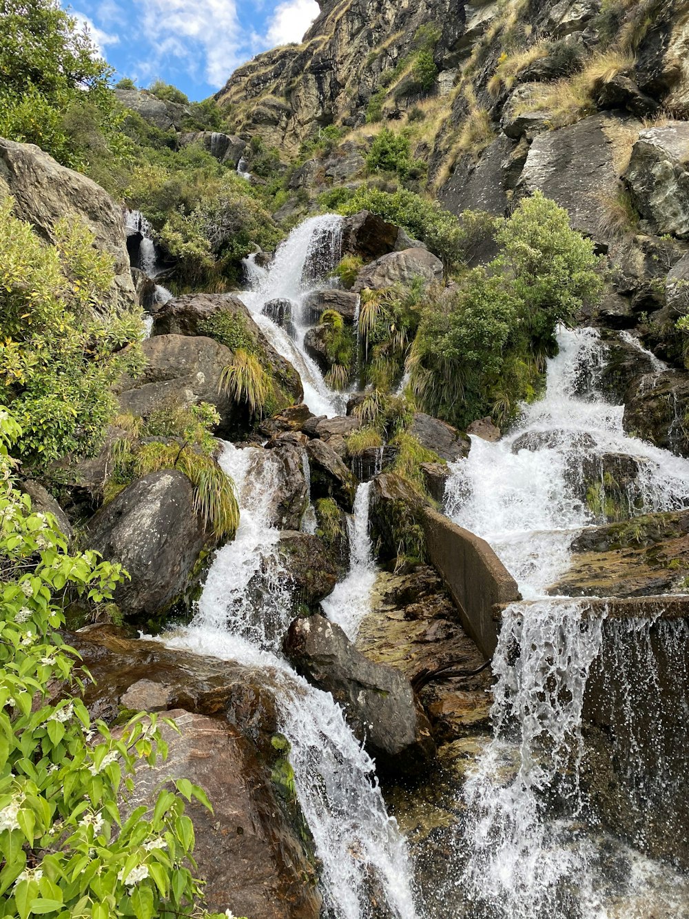 a waterfall in a rocky area