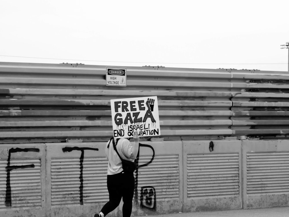 a person walks down the sidewalk