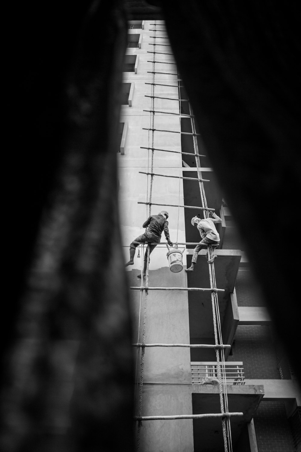 a few men working on a building