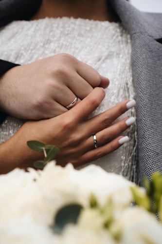 a couple of people holding hands