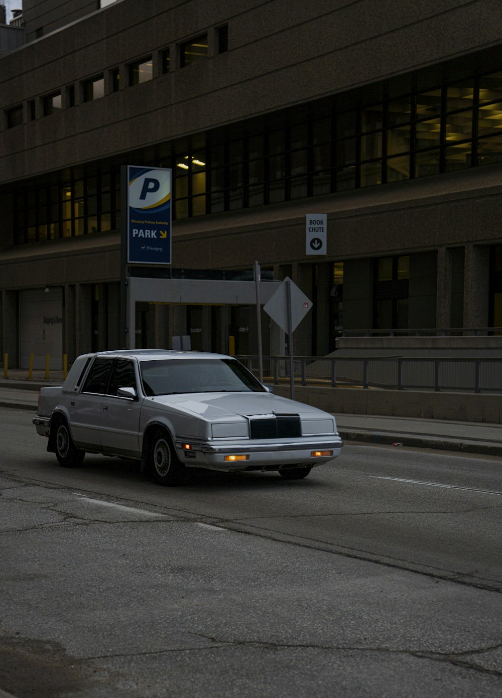 a car parked in front of a building