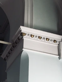 Sophisticated architectural detail of a modern Turkish residence with navy and gold tones.