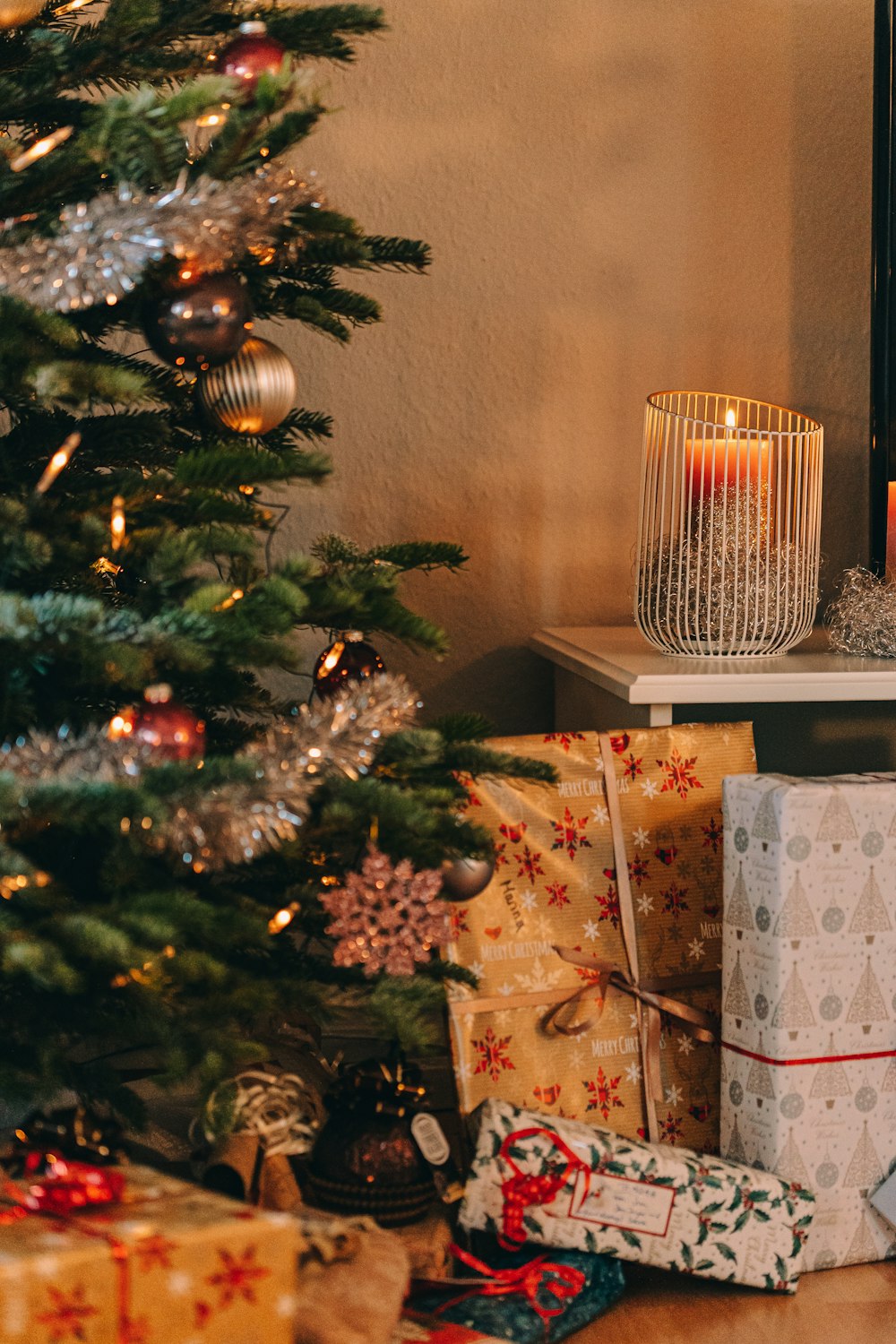 a christmas tree with presents underneath