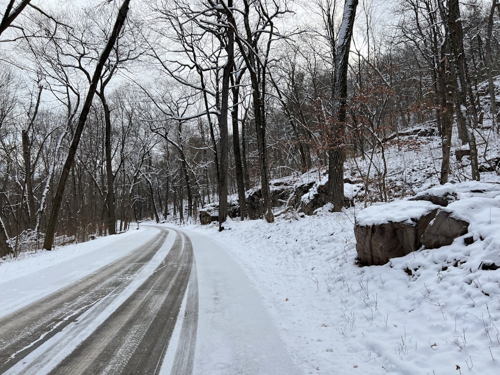 a road with snow on the side