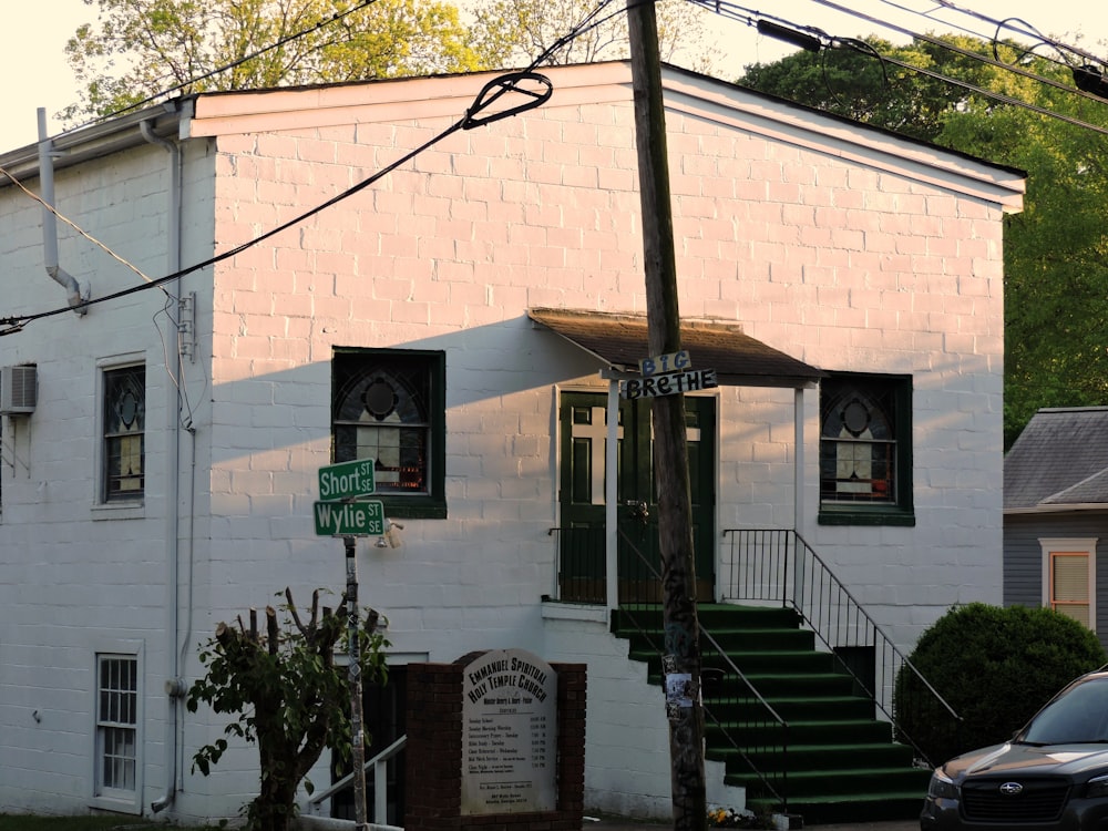 a brick building with signs on the front